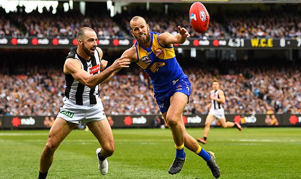 AFL 2018 Toyota AFL Grand Final - West Coast v Collingwood MELBOURNE, AUSTRALIA - SEPTEMBER 29: Will Schofield of the Eagles competes for a mark with Steele Sidebottom of the Magpies during the 2018 Toyota AFL Grand Final match between the West Coast Eagles and the Collingwood Magpies at the Melbourne Cricket Ground on September 29, 2018 in Melbourne, Australia. (Photo by Daniel Carson/AFL Media)